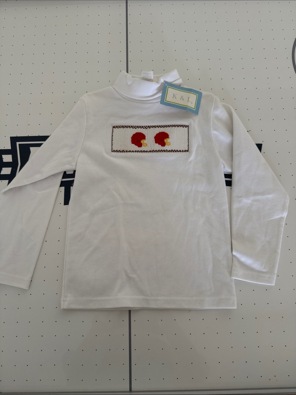 White Long-Sleeve Mock Neck Shirt with Red Helmet Embroidery